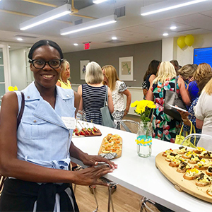 THE FLEET: HAYVN members enjoying a community event with food with other members and local professional community.